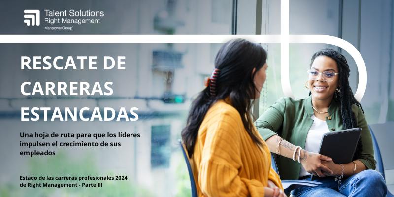 Dos mujeres hablando en una oficina