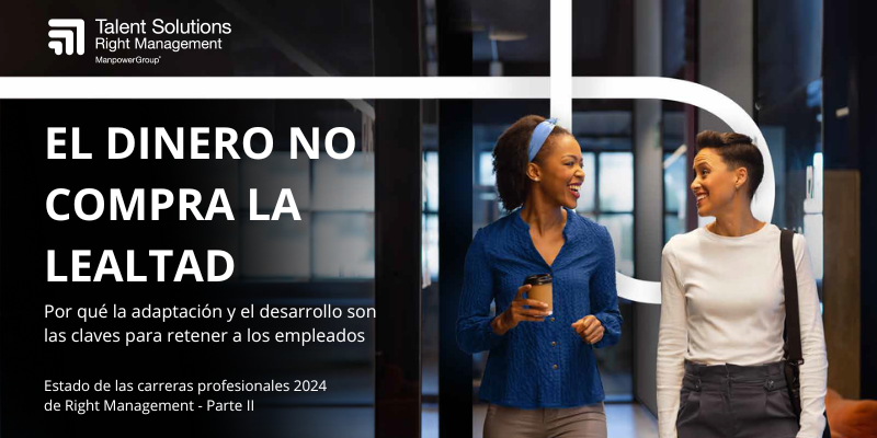Dos mujeres conversando en una oficina